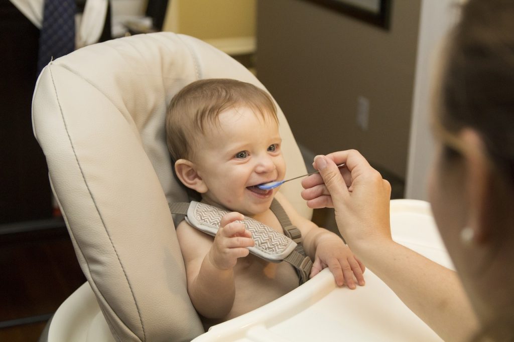 Sugary drinks toxic and unhealthy blog photo of a baby being fed